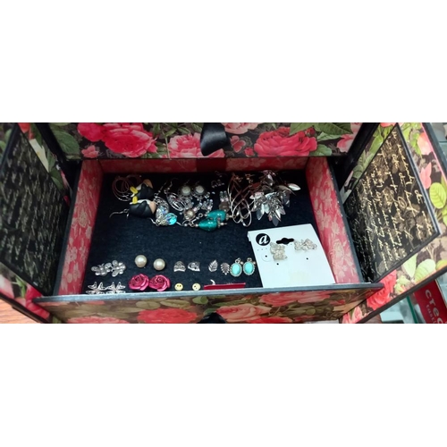 284 - A floral decorated cardboard jewellery box in the form of a cabinet