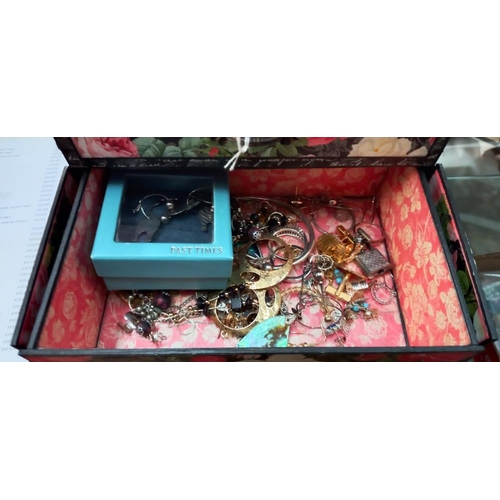 284 - A floral decorated cardboard jewellery box in the form of a cabinet