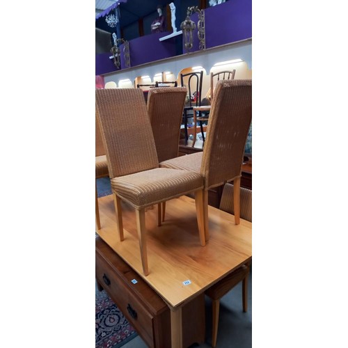 252 - A solid oak topped dining table with wicker frieze & set of 6 Lloyd Loom chairs COLLECT ONLY