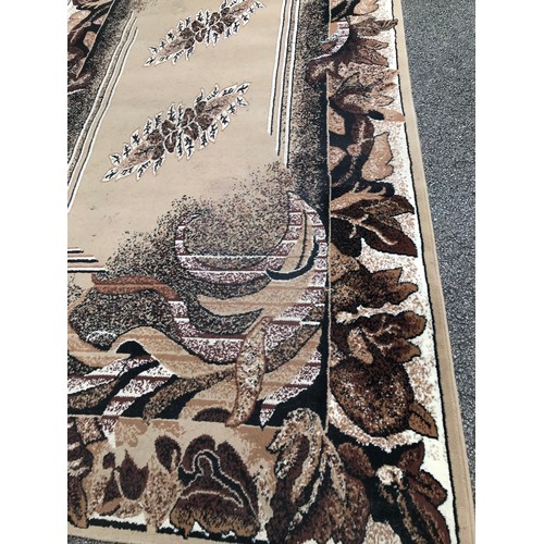 644 - Large cream and patterned carpet