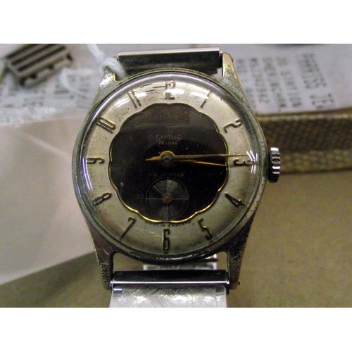 1089 - A vintage boxed Smiths de-luxe 15 jewel wrist watch.