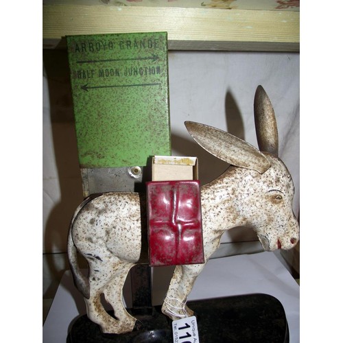 1169 - A rare novelty tin place cigarette dispenser of a donkey.