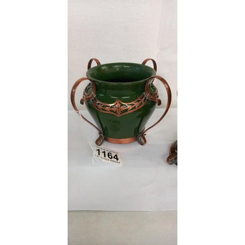 1164 - A pair of Art Nouveau copper bound vases and a similar bowl by H W Ltd., (possibly Hugh Wallis) Heig... 