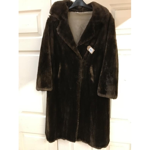 600 - Long Fur coat 
A/F 
Collect only