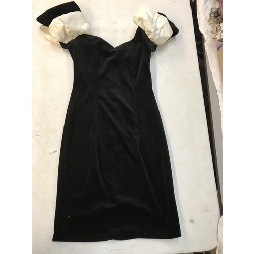 600S - 3 Dresses. 1x Little Black Velvet dress size 14. 1 x 2 tier dress with sequin top. 1x off shoulder d... 