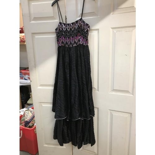 600S - 3 Dresses. 1x Little Black Velvet dress size 14. 1 x 2 tier dress with sequin top. 1x off shoulder d... 