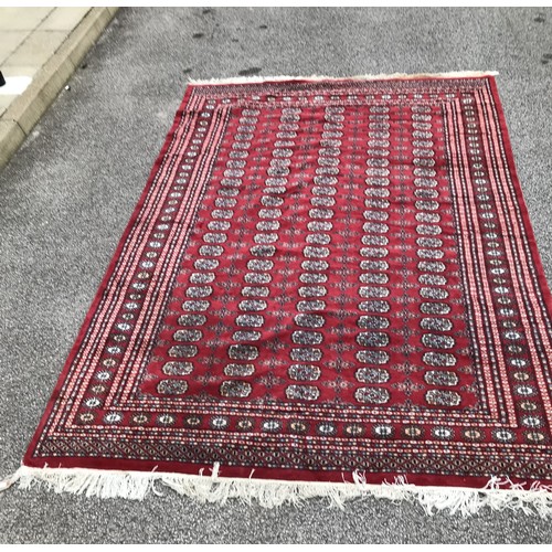 770 - Large Red patterned rug 298 x 185cm approx