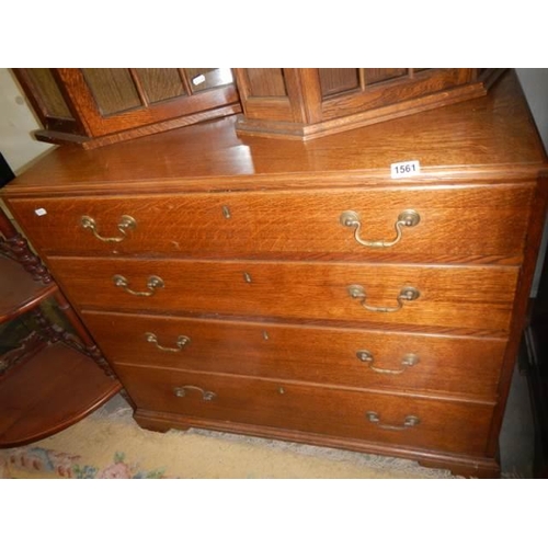 1561 - A 1930's oak chest of drawers. COLLECT ONLY.