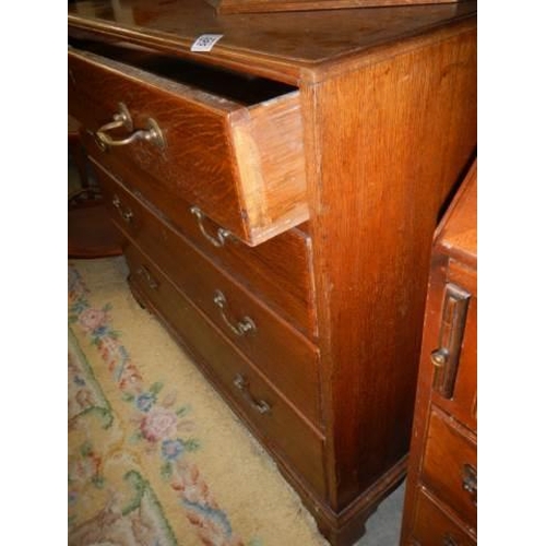 1561 - A 1930's oak chest of drawers. COLLECT ONLY.