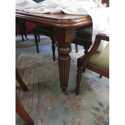 1576 - A good quality Victorian style dining table and eight chairs,. COLLECT ONLY.