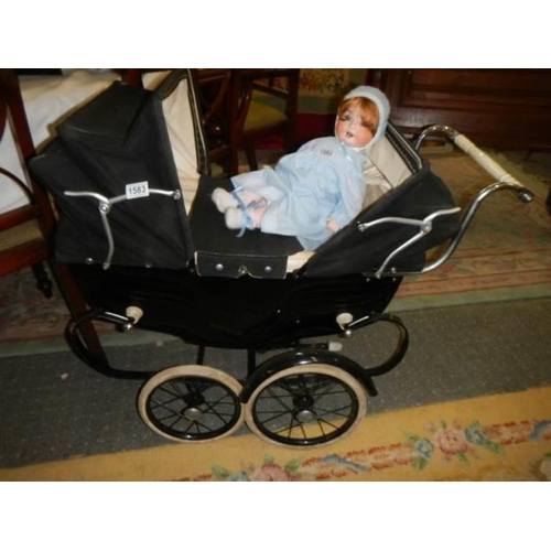 1583 - A 1950's Silver Cross navy twin dolls pram in very good condition, COLLECT ONLY.