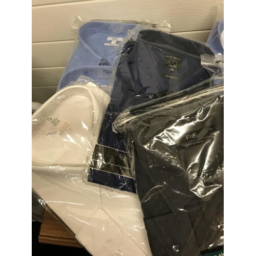 742 - Quantity of men’s shirts mostly size 18. New in bags