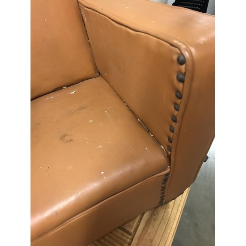 783 - Small child’s leather tan chair. In need of repair