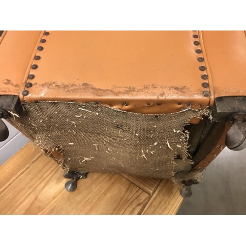 783 - Small child’s leather tan chair. In need of repair