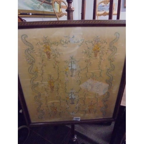 1569 - A Victorian mahogany pole screen with silk panel, COLLECT ONLY.