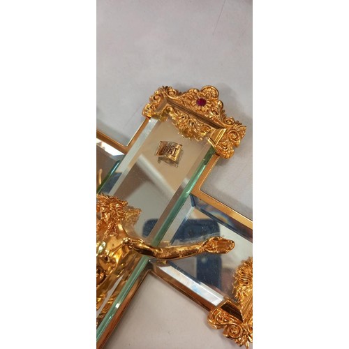 1232 - A boxed gilt mounted glass crucifix.