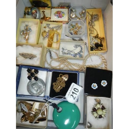 210 - An unusual jewellery box with a mixed lot of costume jewellery.