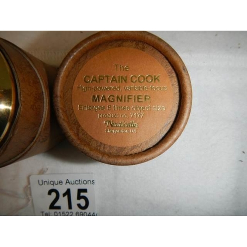 215 - A leather cased 'The Captain Cook' magnifier.