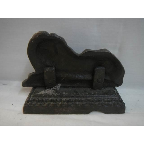 218 - An early cast iron lion doorstop.