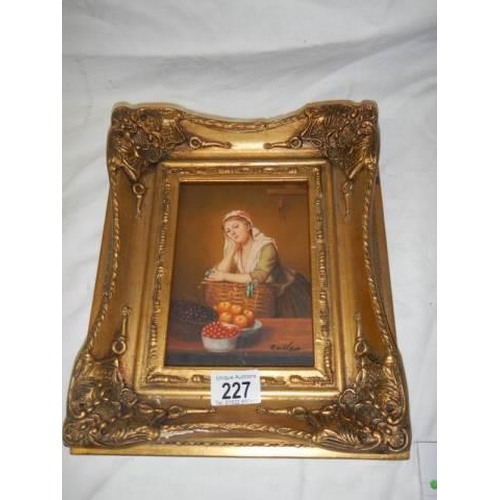 227 - A gilt framed study of a lady.