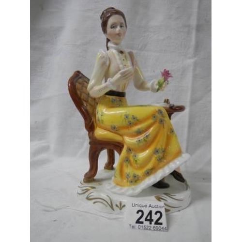 242 - A mid 20th century 'Francesca' porcelain seated lady - Charlotte.