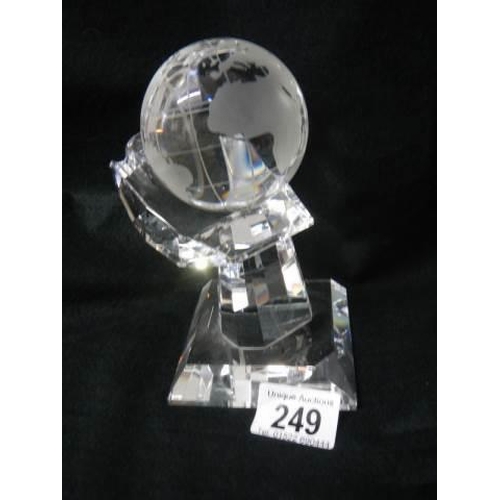 249 - A superb quality crystal glass globe on rotating stand.