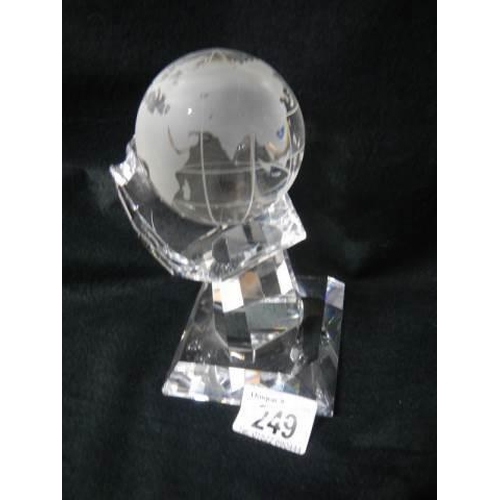 249 - A superb quality crystal glass globe on rotating stand.