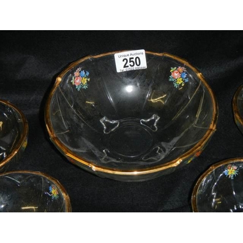 250 - A mid 20th century floral decorated glass fruit set.