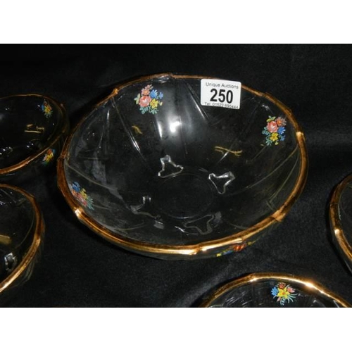 250 - A mid 20th century floral decorated glass fruit set.