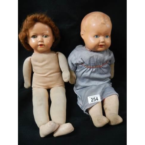 254 - Two mid 20th century dolls.