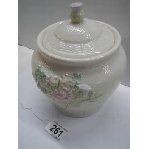 261 - A Belleek biscuit/cookie jar, in good condition.