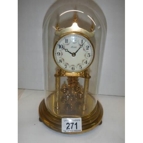 271 - A good quality anniversary clock under glass dome.