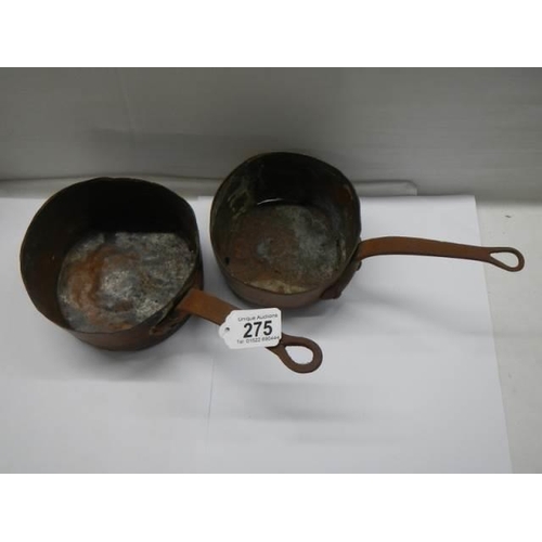 275 - Two old copper saucepans stamped Paris.