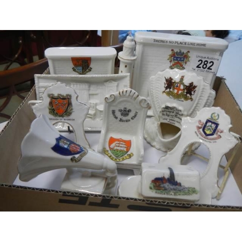 282 - Ten pieces of crested china.