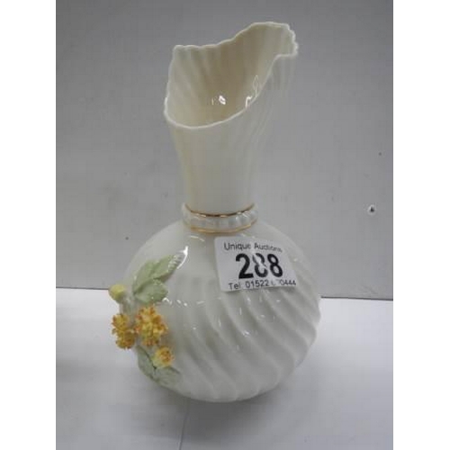 288 - A Belleek vase in good condition.