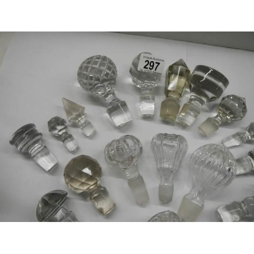 297 - Approximately 20 glass decanter stoppers, various sizes