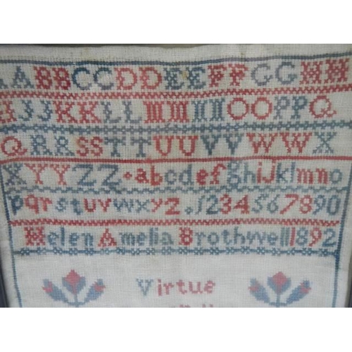 298 - A framed and glazed 1892 sampler by Helen Amelia Brothwell aged nine years.