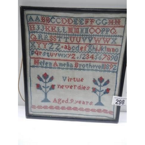 298 - A framed and glazed 1892 sampler by Helen Amelia Brothwell aged nine years.