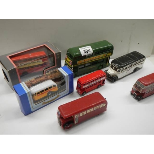 300 - A quantity of die cast buses.