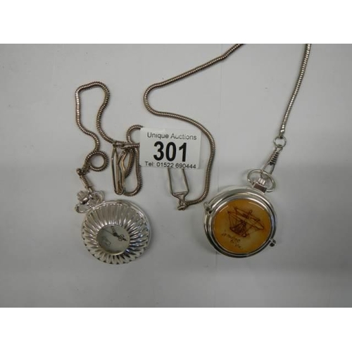 301 - Two 20th century pocket watches on chains and in working order.