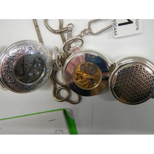 301 - Two 20th century pocket watches on chains and in working order.