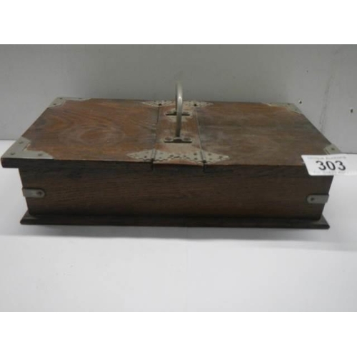 303 - A double lidded oak box.