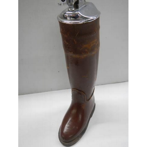 305 - An unusual cigarette lighter in the form of a leather boot.