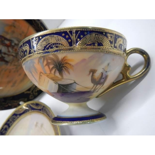 307 - A superb hand painted Noritake trio.