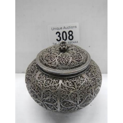 308 - A good quality Indian silver lidded pot.