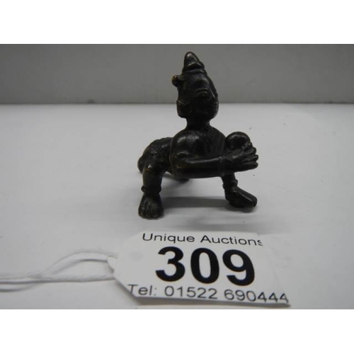 309 - A small Indian bronze crawling baby (poss Indian Diety).