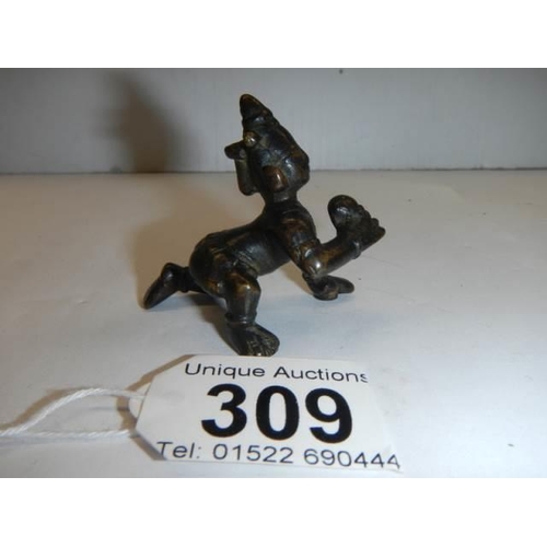 309 - A small Indian bronze crawling baby (poss Indian Diety).