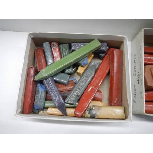 310 - A Wax seal and two trays of sealing wax.