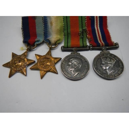 313 - A set of four miniature WW2 medals.