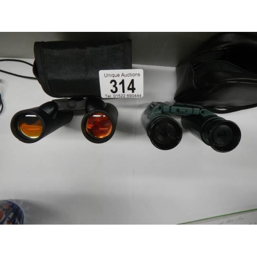 314 - Two good cased binoculars - 10 x 25 DCF field and 5.5.